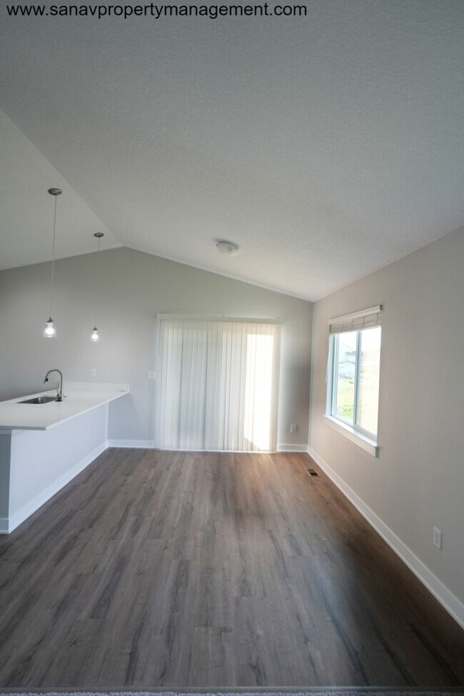 Building Photo - "Modern Comfort Meets Convenience: Your Ideal Home in Waukee"