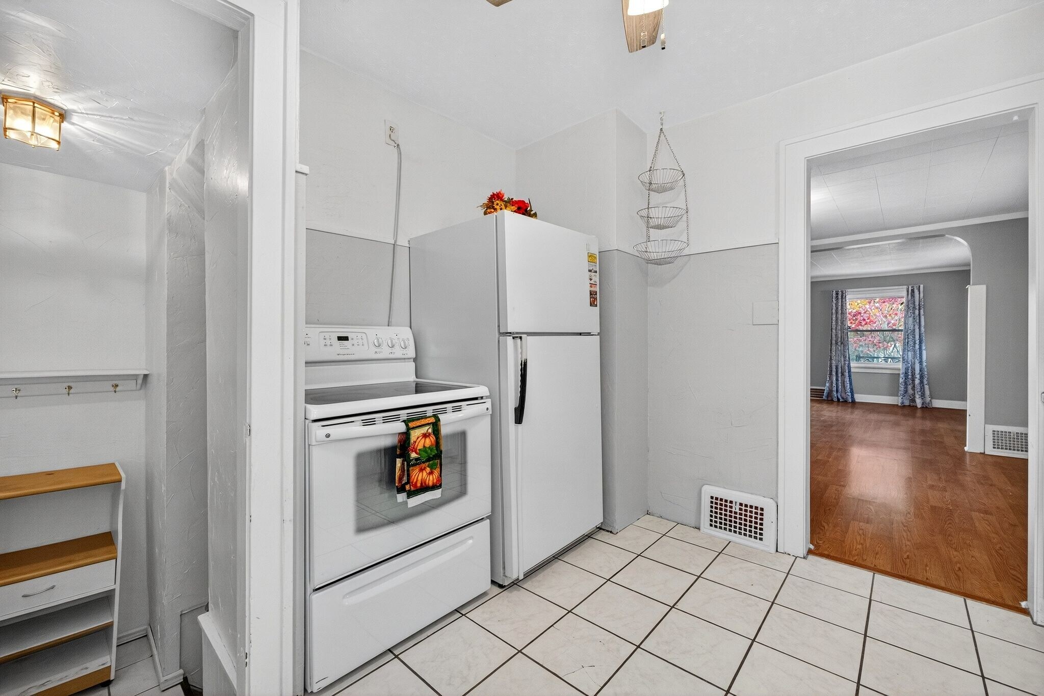 Kitchen with Fridge and Electric Stove - 4429 S Hills Dr