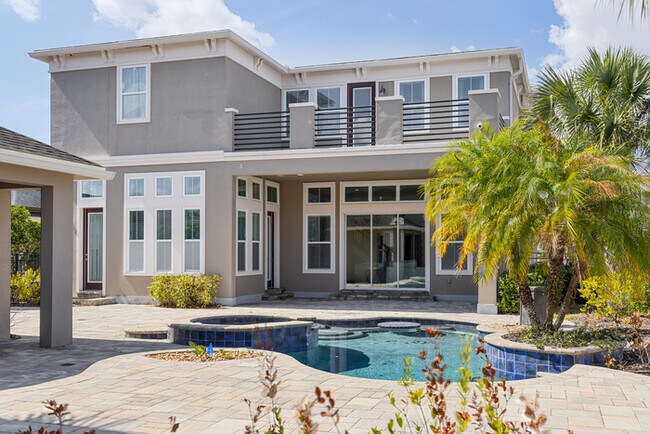 Building Photo - Luxury Waterfront Pool Home in Laureate Park | 4BR + Water Views