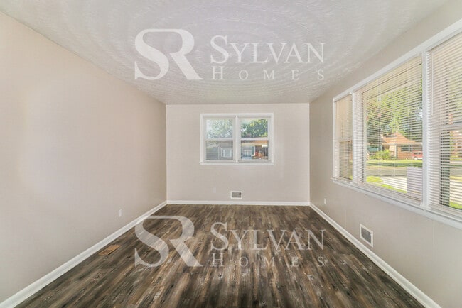 Building Photo - Lease today! No extra charge for contentme...
