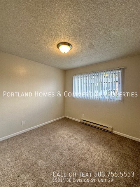 Building Photo - 2-Bedroom Apartment, Downstairs, Near Tran...