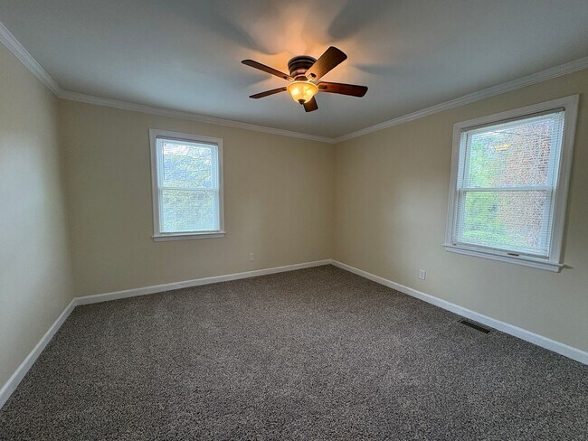 Building Photo - Beautiful refurbished home with hardwood floors throughout!