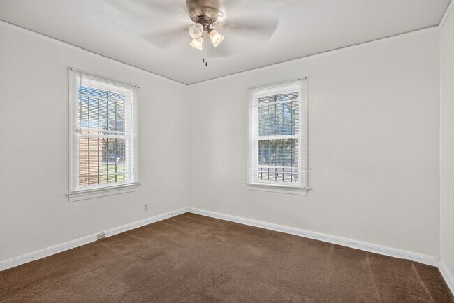 Building Photo - Spacious 3-Bedroom Corner Home with Garage & Private Courtyard