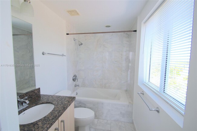 Building Photo - 6362 Collins Ave