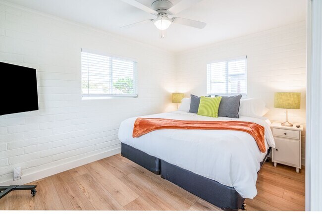 Building Photo - Enjoy stunning sunsets and beach living at its finest, Short Walk to Beach