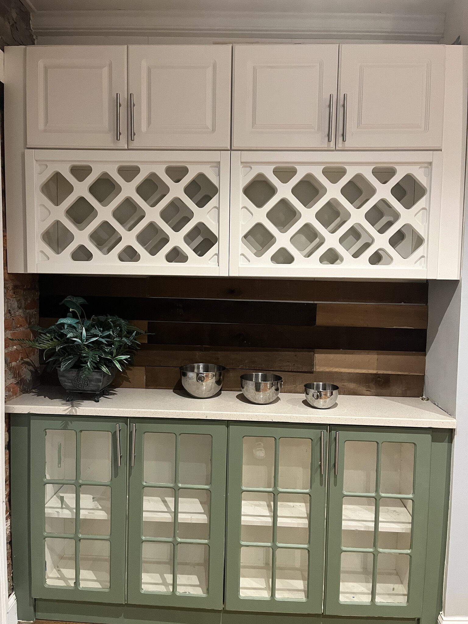Kitchen w/glass front cabinets & wine rack - 223 Jackson St