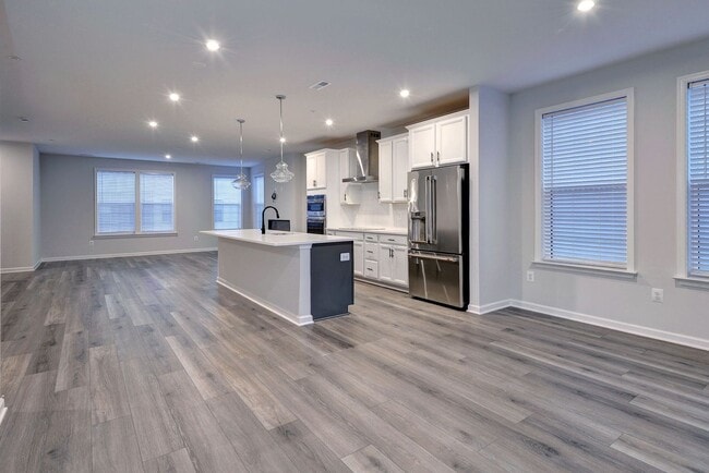 Building Photo - Three Story Brick End Unit with Rooftop Terrace