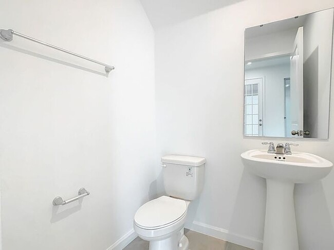 Building Photo - New Luxury Townhome in Celebration with All porcelain tiled floors. Island Village new construction