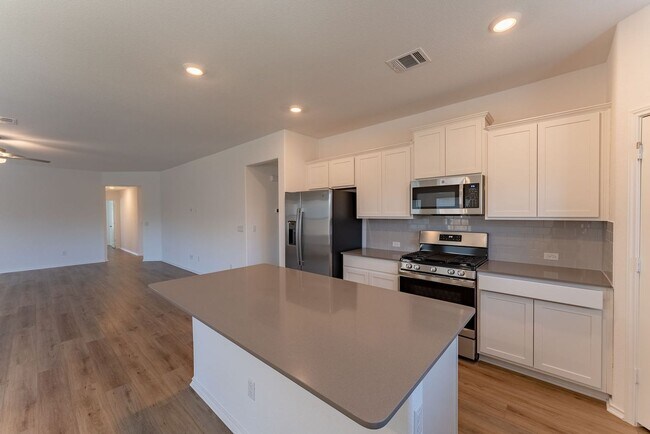 Building Photo - Modern Elegance in Kyle: 3BR Home with Office, Double Vanity, and Stylish Kitchen Island