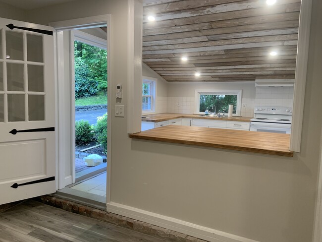 open eating area into living room - 134 Wheatley Rd