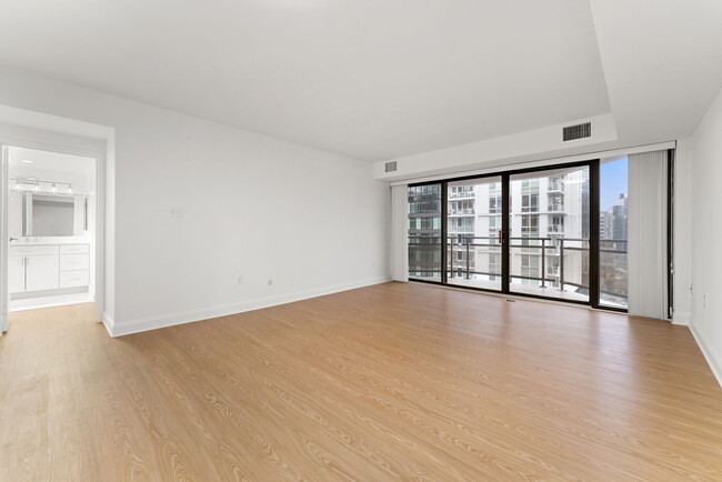 Spacious living room with luxury vinyl flooring - 1530 Key Blvd