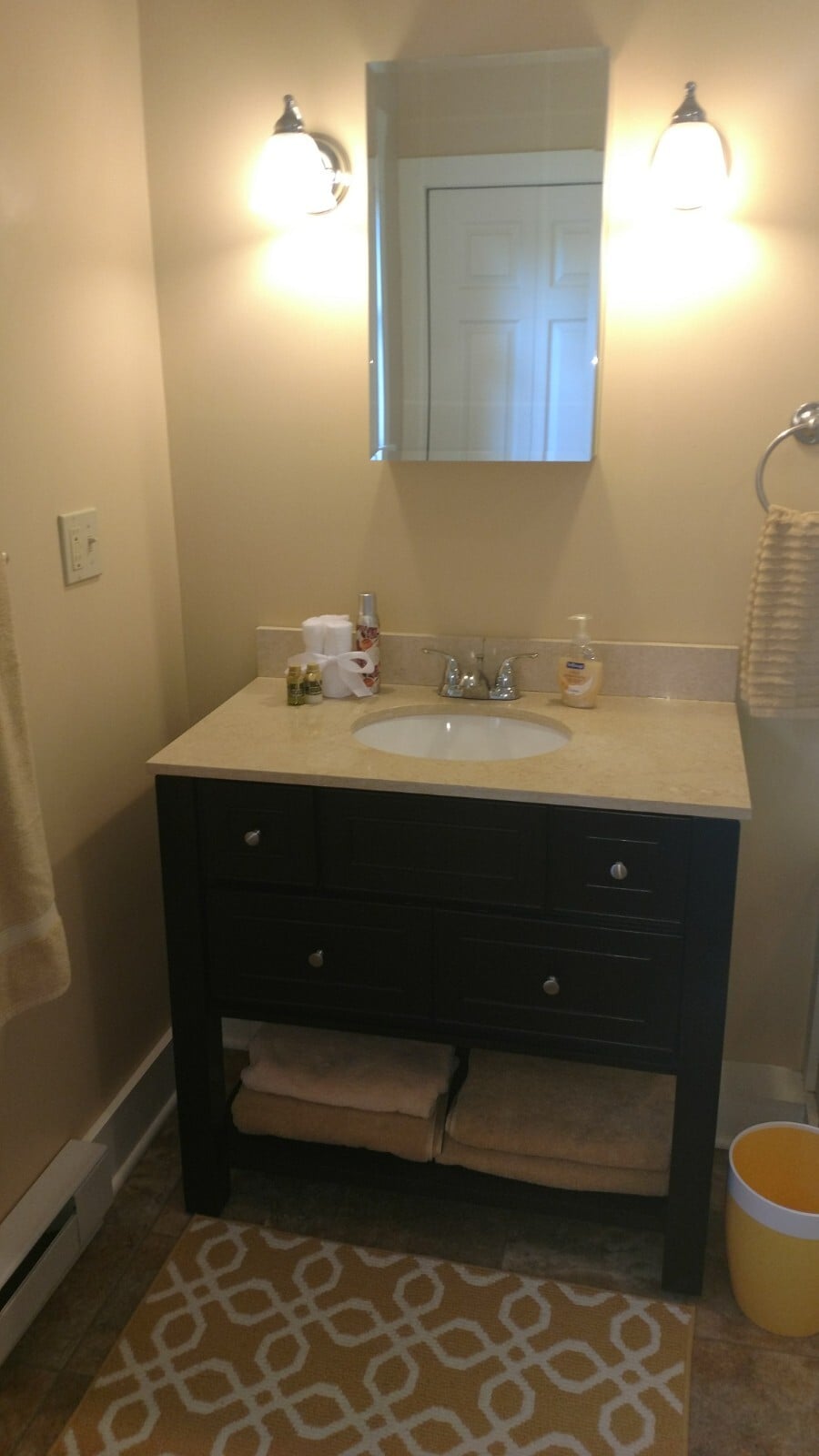 Bathroom vanity with natrual stone counter, storage and medicine cabinet - 156 Henry St