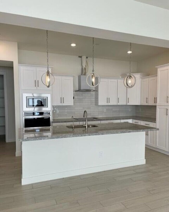 Building Photo - Executive Single-Story 4-Bedroom Rental with $50K+ Upgrades & Indoor-Outdoor Living in Chandler, AZ