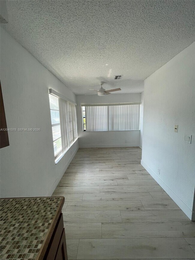 Building Photo - 2580 Coral Springs Dr