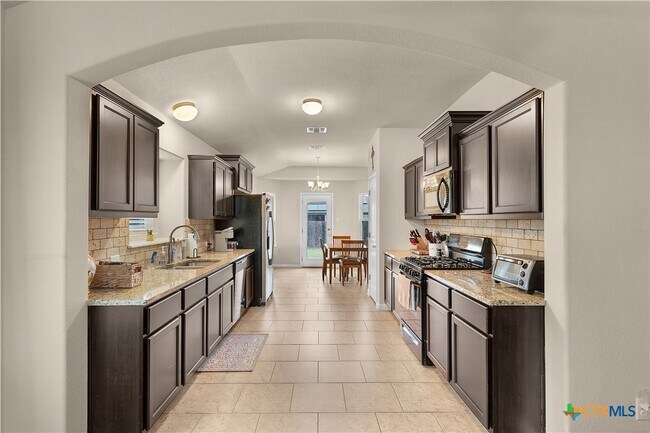 Building Photo - 8064 Bassano Dr