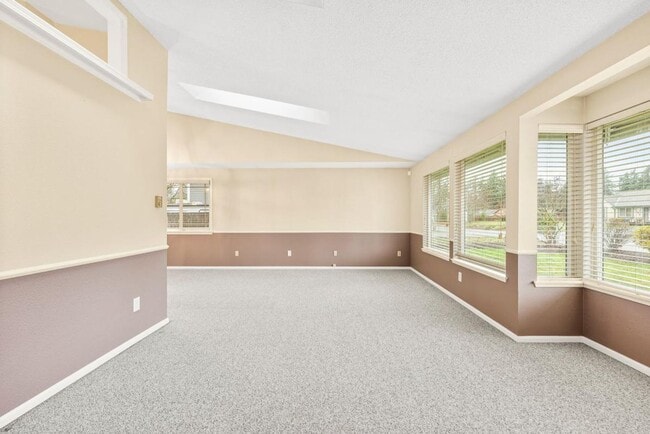 Building Photo - Charming Tacoma Home with A/C, RV Parking, Workshop & Skylit Living Room