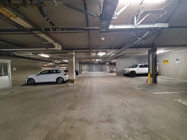 Building Photo - Downtown High-Rise Studio with parking and in-home laundry