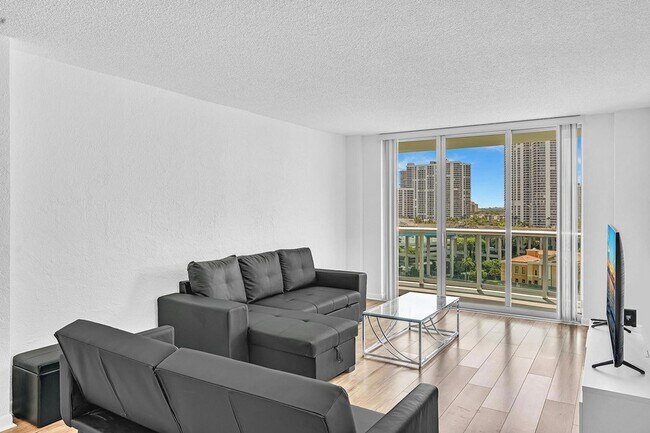 Building Photo - 19390 Collins Ave