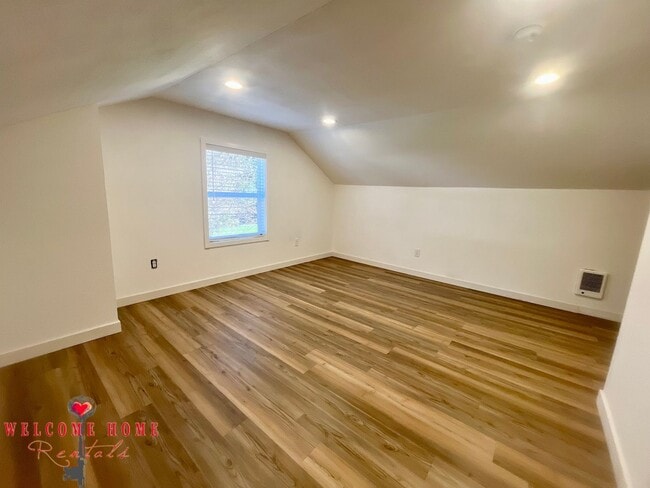 Building Photo - 4 bedroom home with air conditioning - Great location!!!  HUGE basement for your man cave or she ...