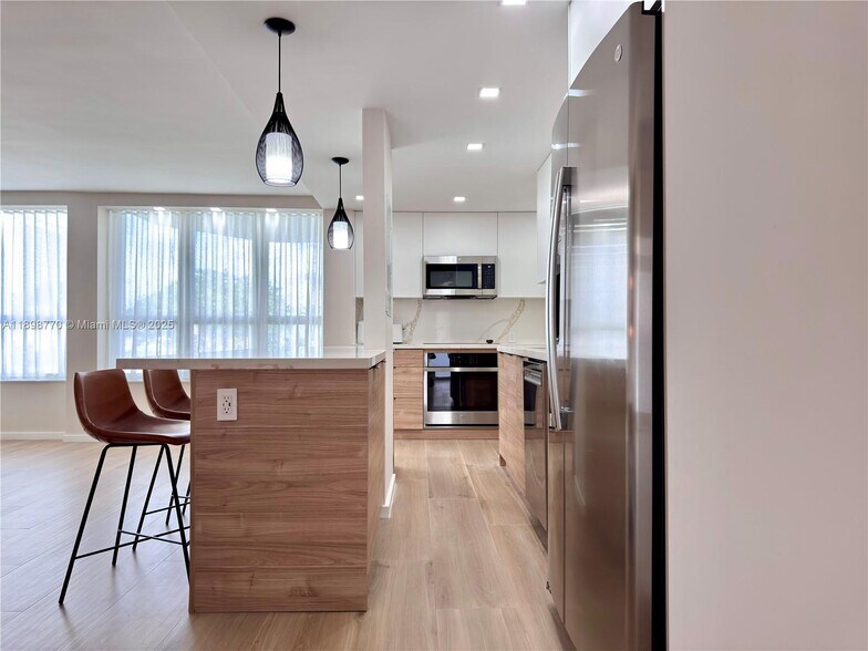 Building Photo - 10230 Collins Ave