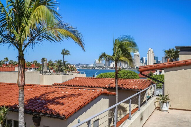 Building Photo - Luxurious Condominium | Rooftop Deck with Bay and Downtown Views