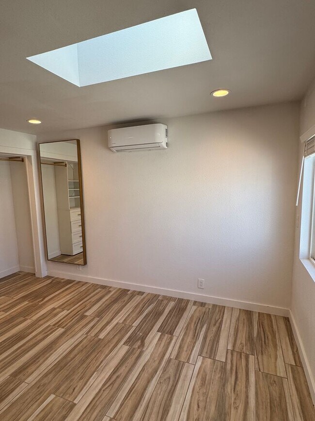 Building Photo - !! MOVE-IN SPECIAL !! Cozy Carson Back House with Skylights & Washer/Dryer