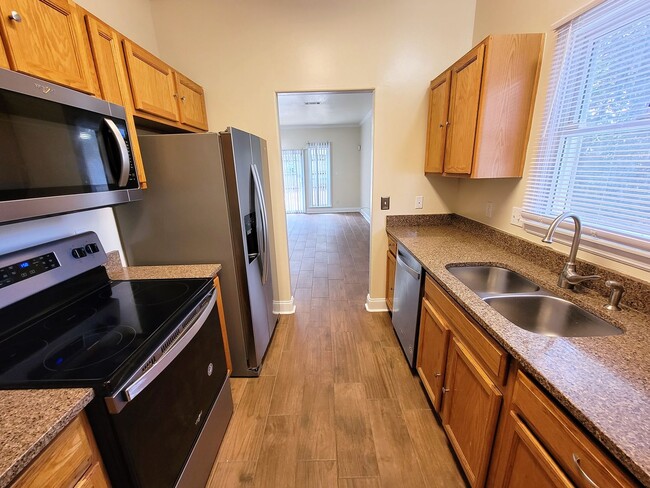 Building Photo - 3 bedroom town home for rent starting June 8, 2026, renting for $1800, includes privacy fenced ya...
