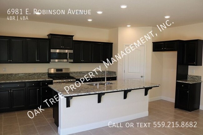 Building Photo - 6981 E Robinson Ave