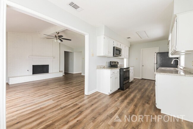Building Photo - 3 BR/2BA | Newly Renovated Single Family Home | Fireplace in living room | Fenced backyard!