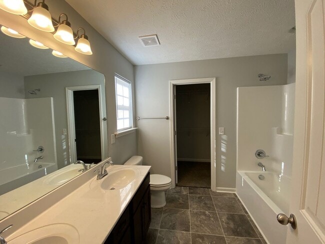 Building Photo - New 3 Bedroom 2 bath home with 2 Car Garage
