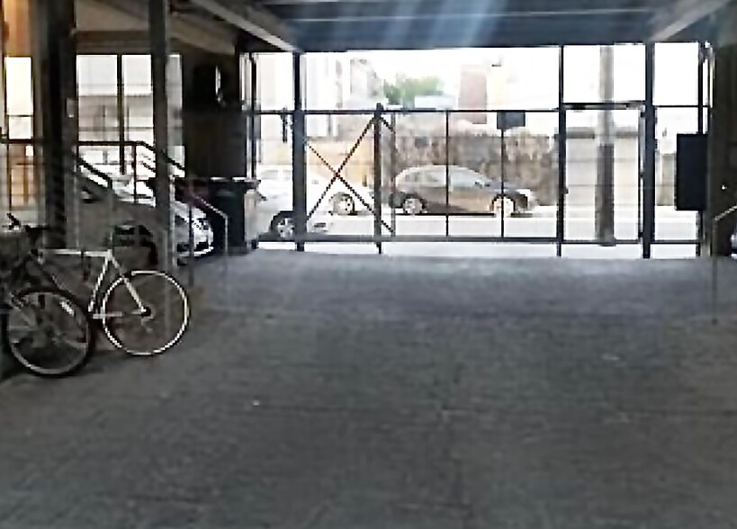 Gated parking and keypad access to building once inside gates. - 1535 North Philip Street