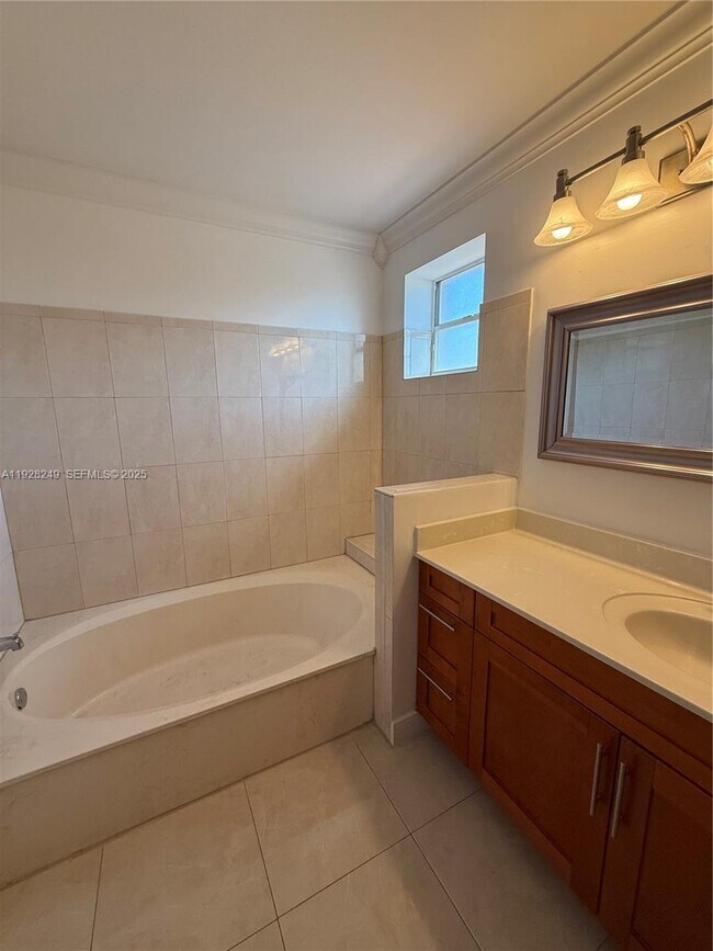 Building Photo - 5588 NW 102nd Ct