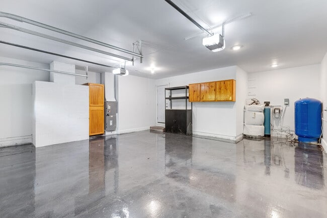 Building Photo - BEAUTIFUL UPDATED RAMBLER WITH LARGE GARGE