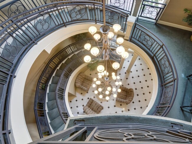 Staircase in main office and community areas. - 4860 Eisenhower Ave