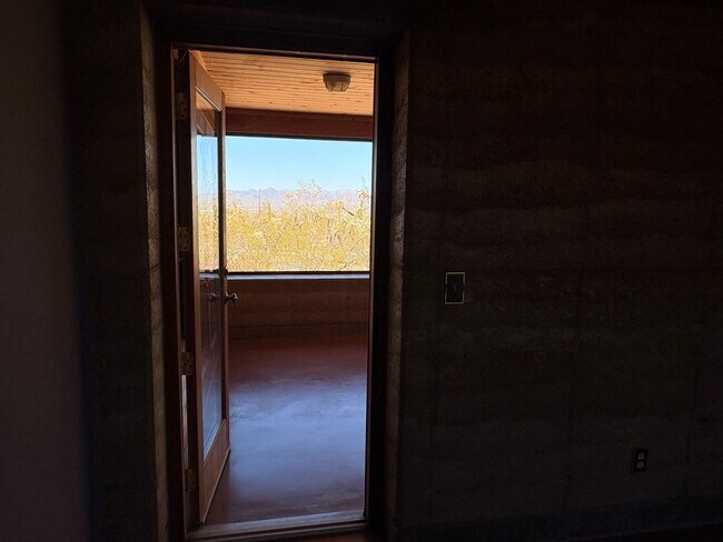 Building Photo - Desert Home on 3.3 Acres with Rooftop Views & Unique Rammed Earth Design