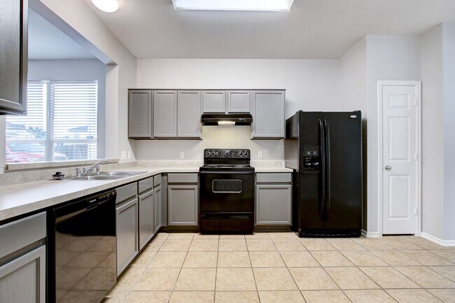 Building Photo - 3-Bedroom Townhouse with Open Floor Plan and Spacious Backyard Near Lackland AFB