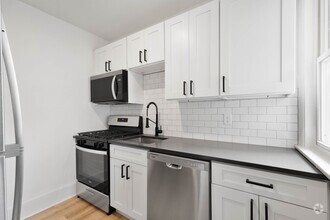 Building Photo - RENOVATED TOP TO BOTTOM! 2-BEDROOM IN THE ...