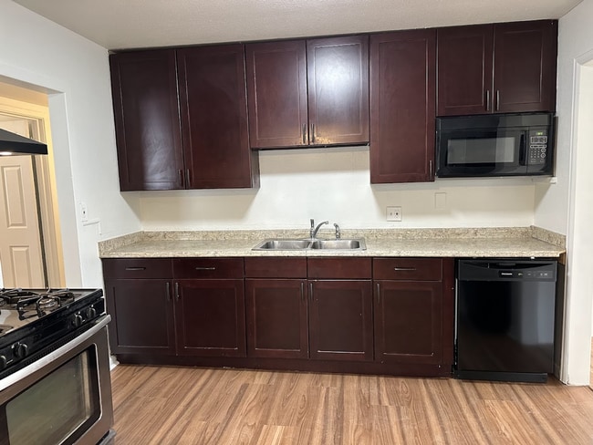 Building Photo - Spacious 4-Bed Home with Garage Near I-225 and Parks!