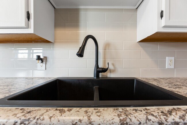 Building Photo - 4655 Curtis Ave