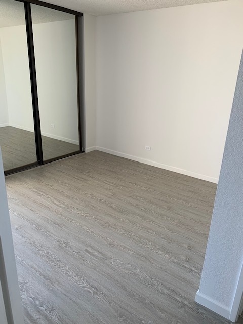 New flooring in bedroom - 2100 Date St