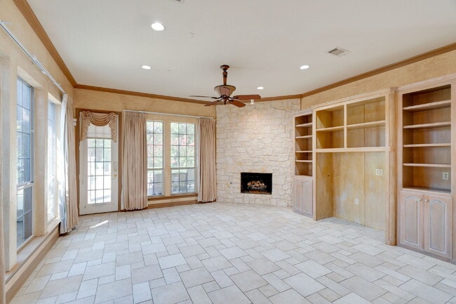 Building Photo - "Stately Gated 5-Bedroom Estate With Pool, Custom Details & Abundant Living Space!"