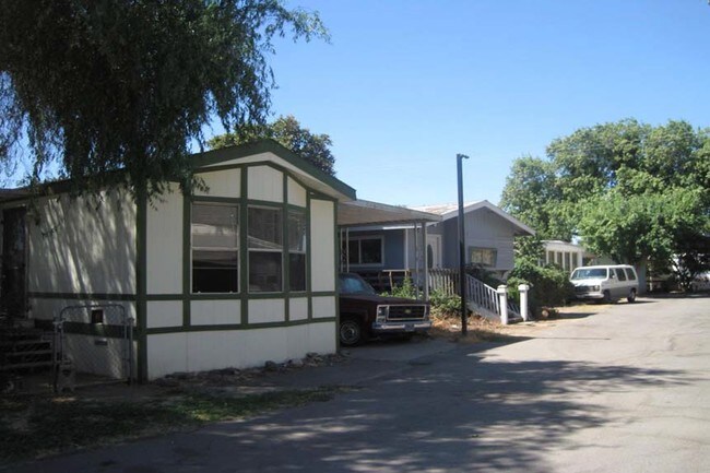 Building Photo - Twin Cypress Mobile Home Park