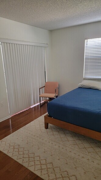 Master bedroom that leads to lanai - 5647 Summer Side Ln