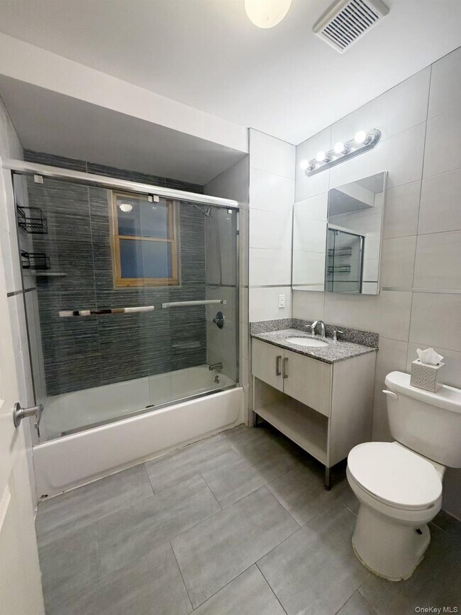 Building Photo - 64-14 Perry Ave