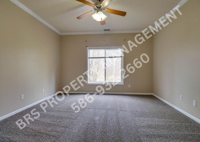 Building Photo - Ground Floor 2 BR, 2 BA condo with attached garage