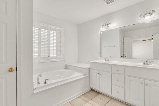 Building Photo - Spacious 5 Bedroom Home with 3rd Floor Suite, Fenced Yard & Community Amenities – $3,500/mo