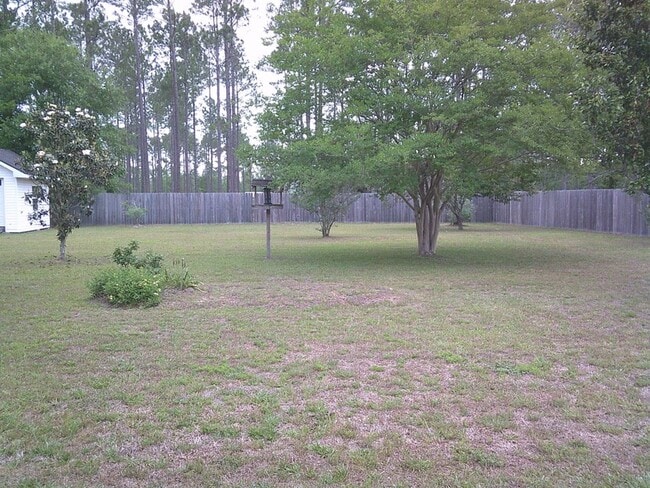 Building Photo - Spacious 3BR Home with Screened Porch, Fenced Backyard & Wired Shop in North Valdosta