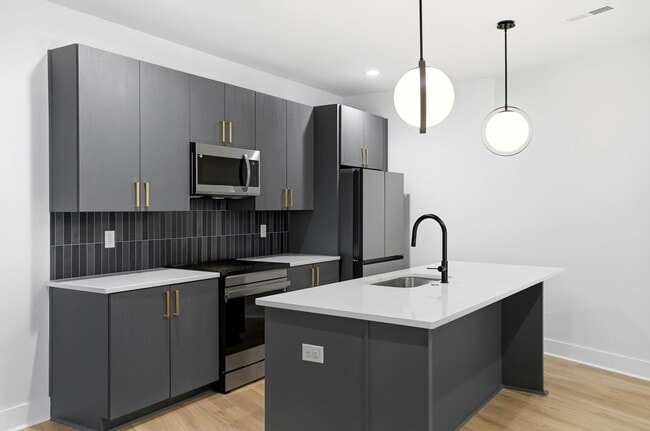 Building Photo - Bright, Open & Exceptionally Large—Your Ideal 2-Story Townhome