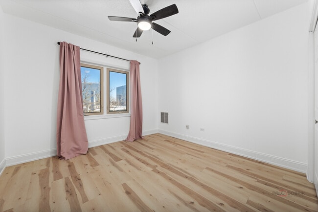 Building Photo - 8727 W Bryn Mawr Ave