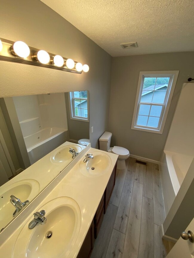 Building Photo - Updated, 4 Bedroom, Split Level Home